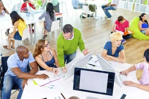 Can_Dress_Code_be_a_Business_Strategy.jpg coworkers in an office- JConnelly blog- can dress code be a business strategy