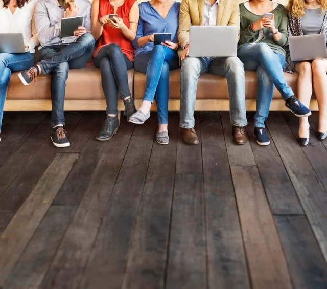 People Sitting on Couch with Tablets- 3 Questions to Ask about Content Distribution .jpg People Sitting on Couch with Tablets- 3 Questions to Ask about Content Distribution .jpg