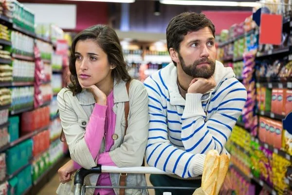 Man and Woman at supermarket- JConnelly blog- Don’t Slip into the Comfort of Conformity