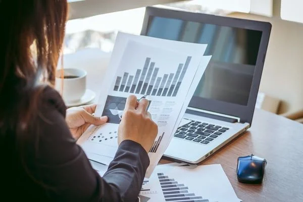 Woman looking at data- JConnelly blog- What Brands Need to Know about Facebook's New Third-Party Data Rules