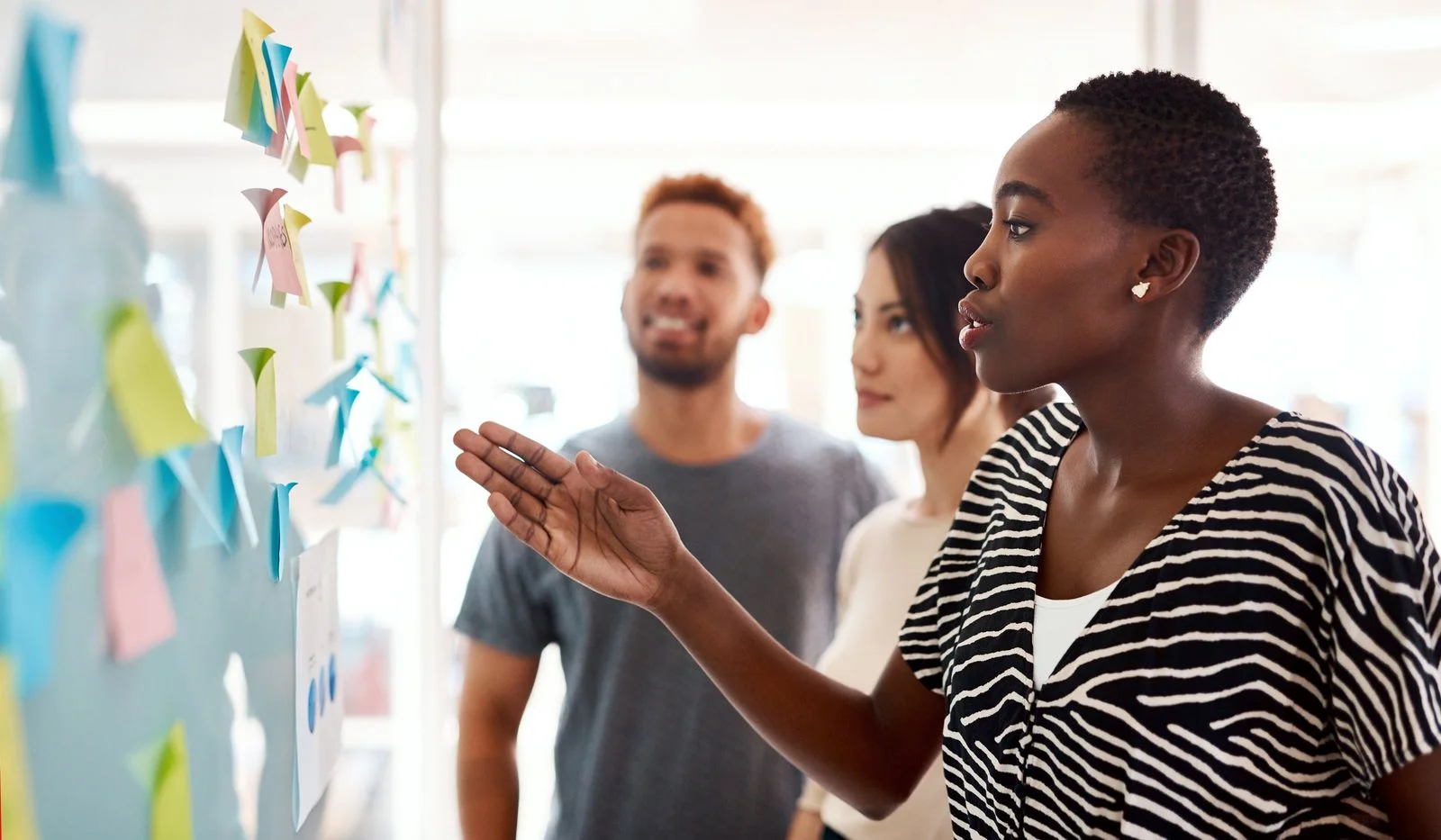 JConnelly Blog- 3 Ways to Enhance Brand Message- Coworkers Brainstorming