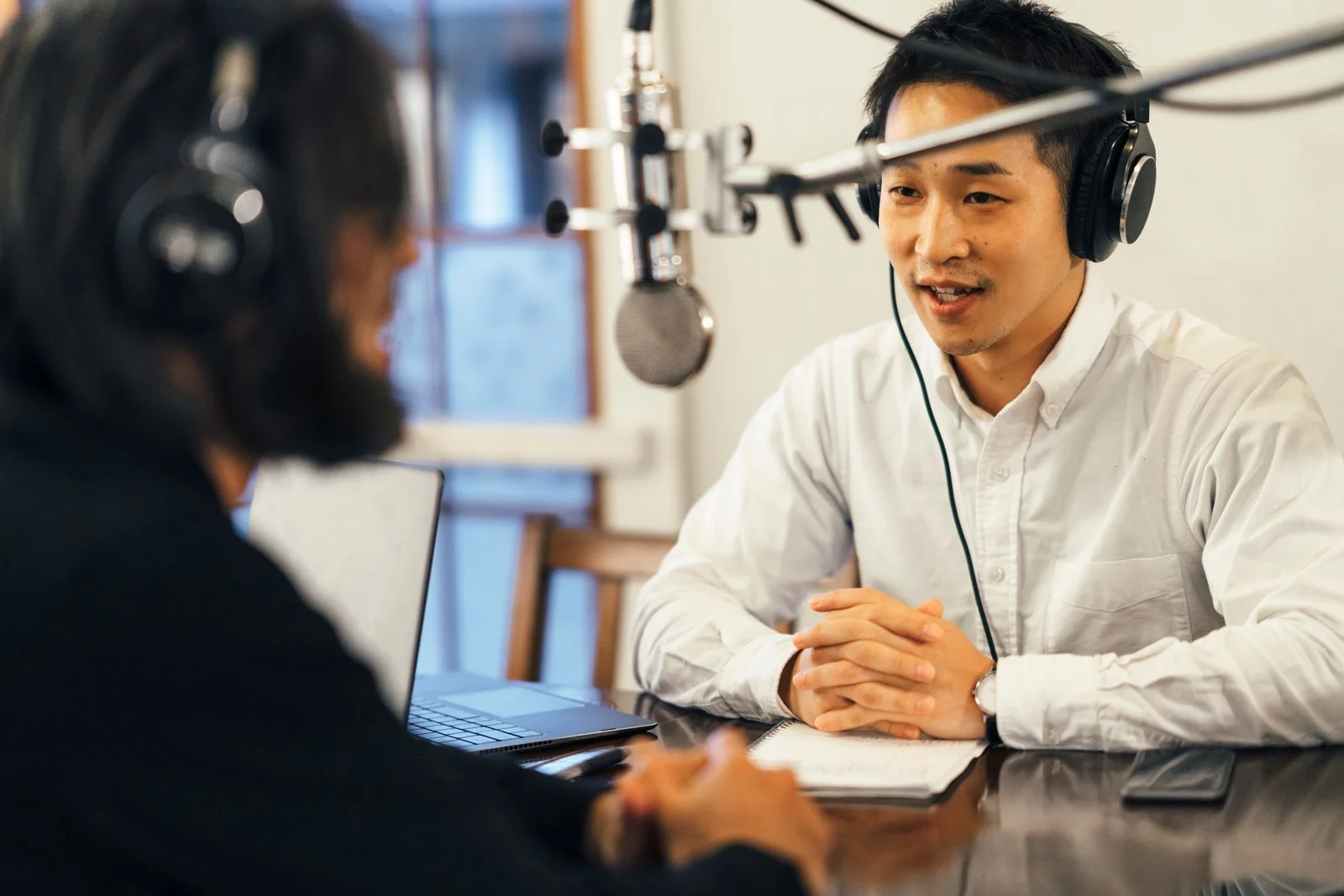 men interviewing - JConnelly Blog - Make Your ESG Messages Fit the Medium