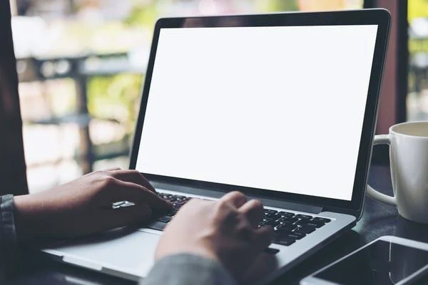 Typing on laptop- JConnelly blog-Polish Your Lead