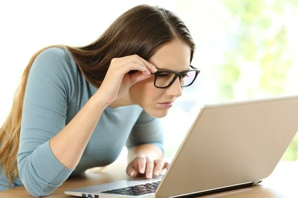 Woman Trying to Look at Computer Screen- JConnelly blog- Social Media Has Work to Do to Win Back Users