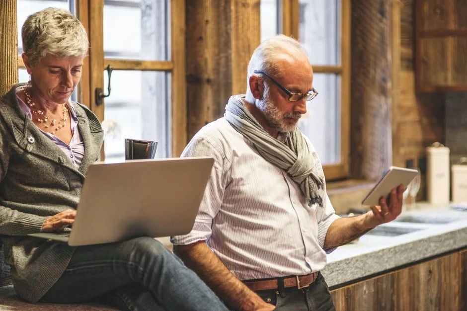man and woman on laptop- JConnelly blog- social media isn't just for kids