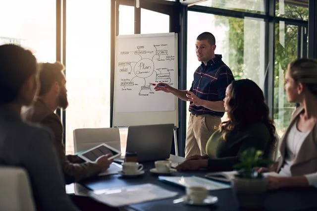 Coworker Giving Presentation. Top 5 Content Ideas Blog JConnelly.jpg