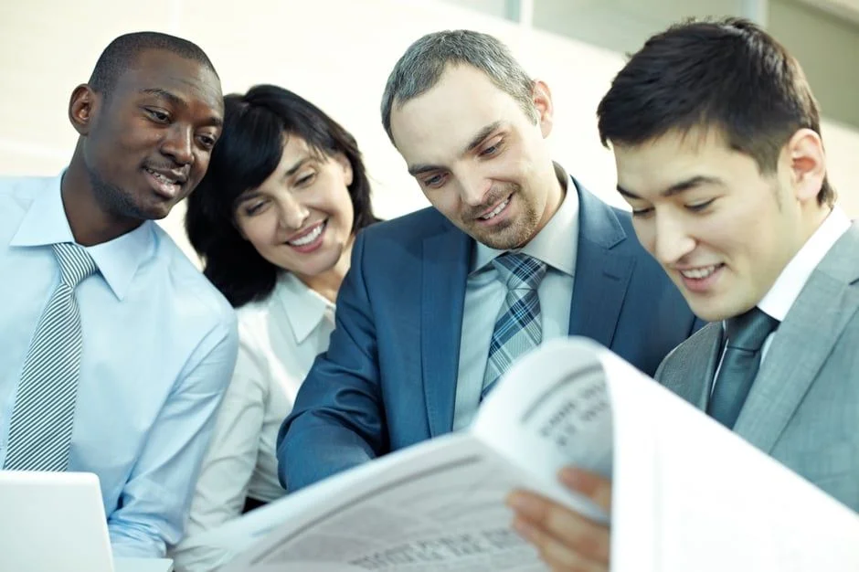 People reading newspaper- JConnelly blog- how to execute effective PR